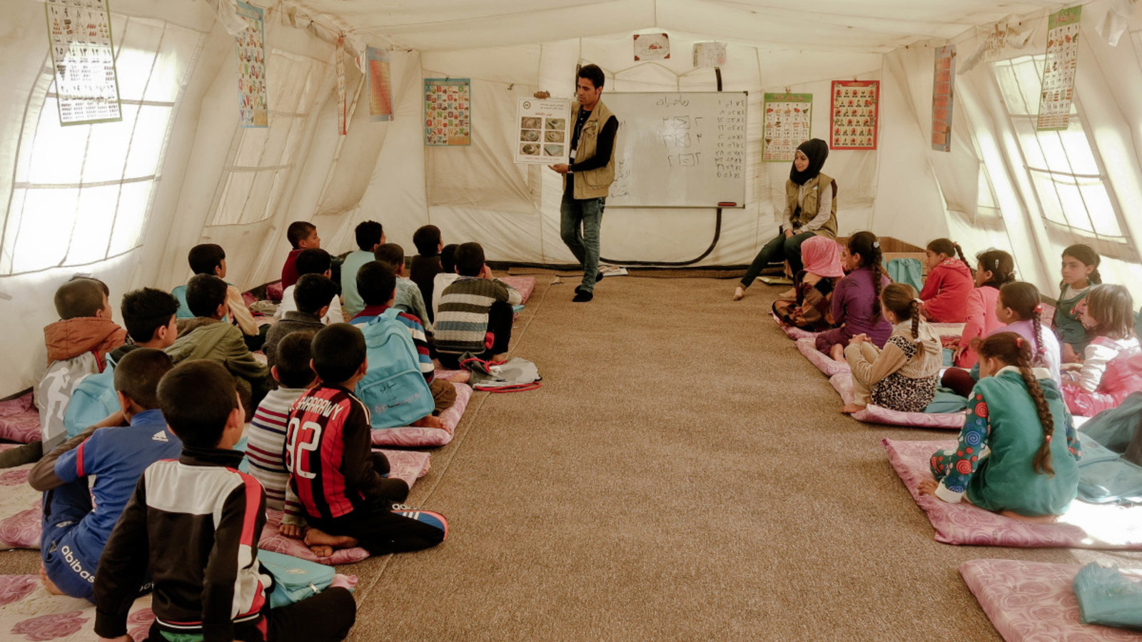 Une séance d’éducation aux risques à des personnes déplacées en Irak