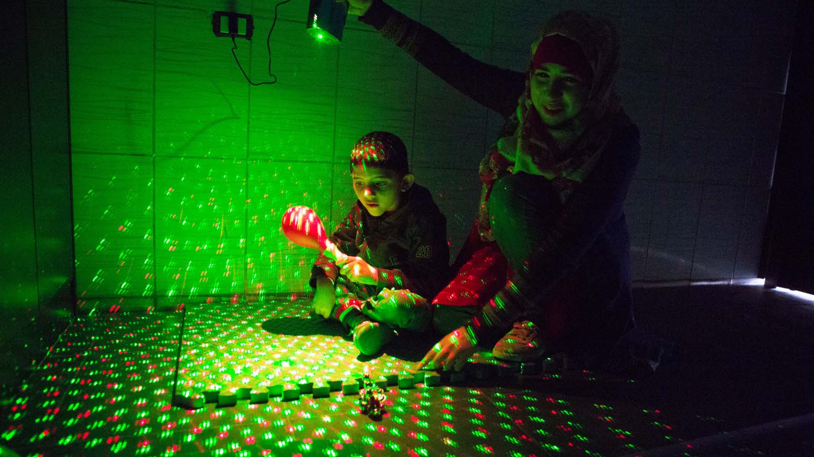 Youssef attends an occupational therapy session with Maya 