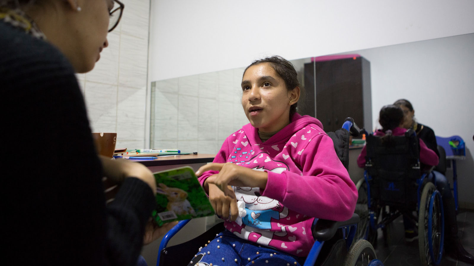 Bayan attends a speech therapy session at the Mousawat rehabilitation centre 