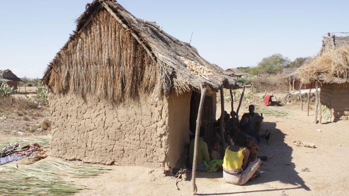 A family sits in the shade in Betioky, one of the regions affected by the severe drought in the south of Madagascar