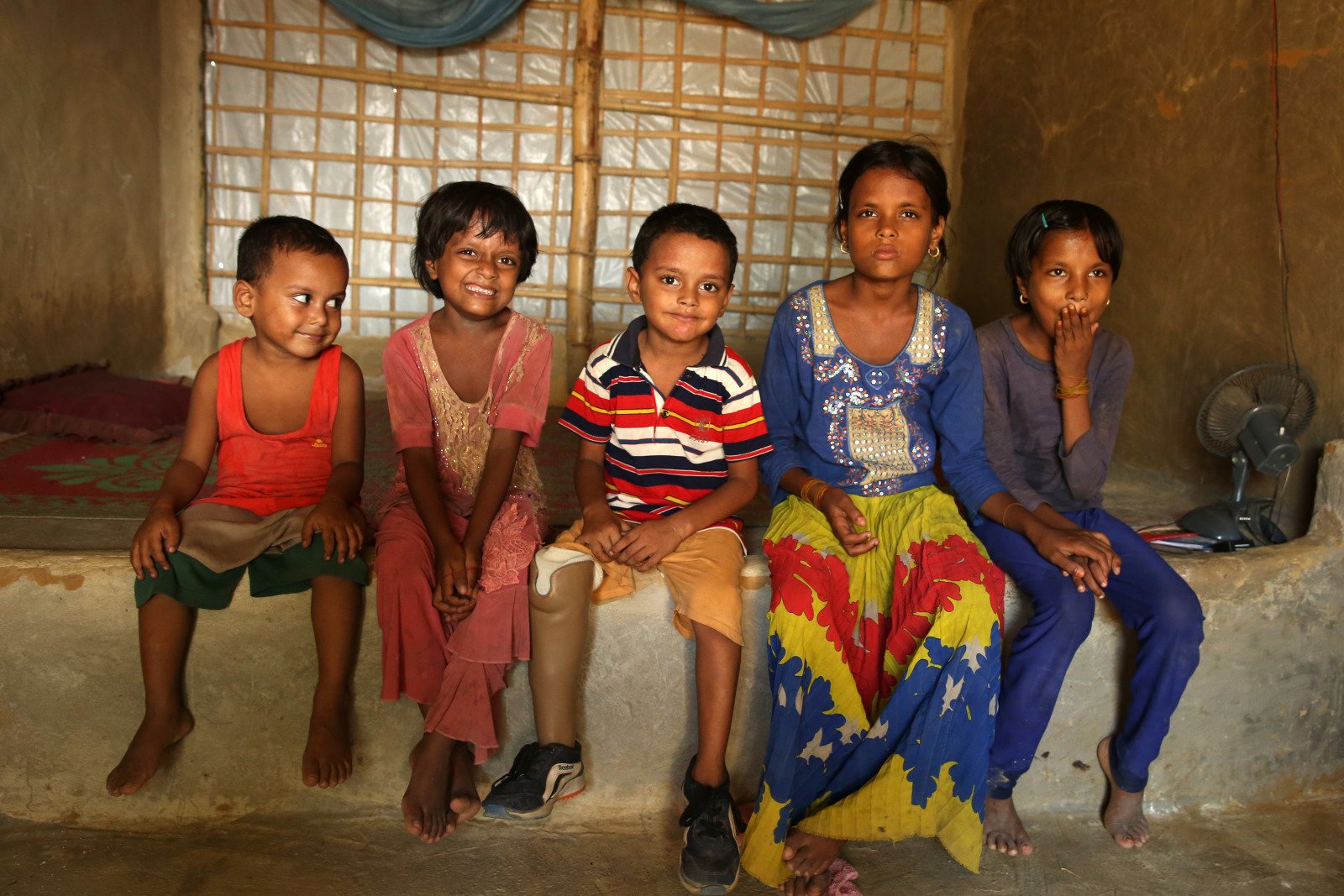 Anowar, 9, is living in Bangladesh refugee camp, Coxs Bazar, with his family. They are Rohingya from Myanmar. He had to be amputated at his right leg after a road accident after coming in Bangladesh. He received a prosthesis thanks to HI support, and foll