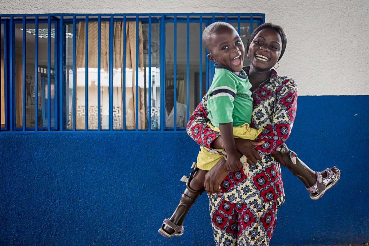 Jeanne and her son Jacques, who has just been fitted with orthotics