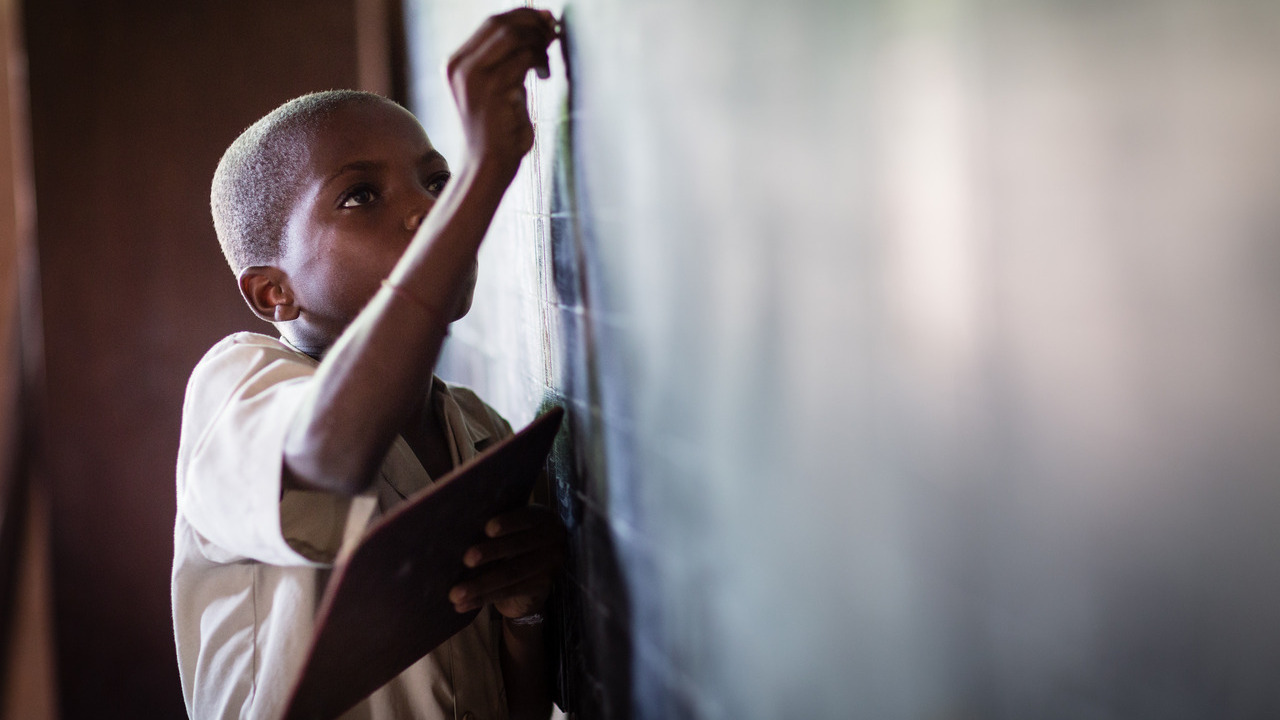 Young boy who can walk again thanks to community based rehabilitation sessions he can benefit. He is able to go to school and is included in mainstream school.