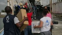 HI staff loading crutches and wheelchairs in the port at Les Cayes, Haiti 2021