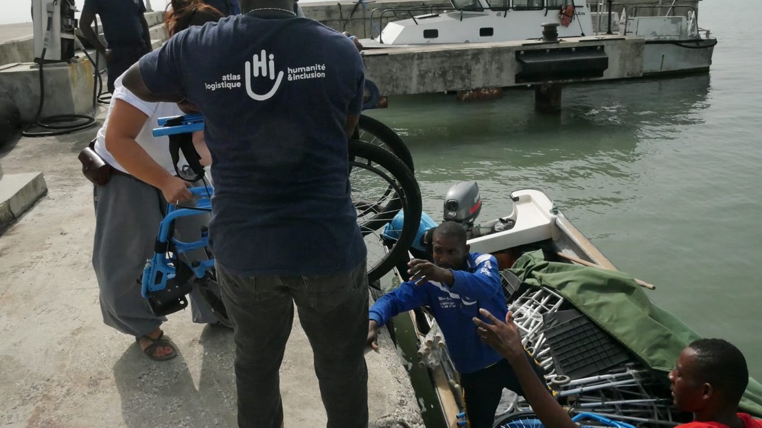 Delivery of walking aids in the Cayes region in Haiti. The equipment is delivered by boat