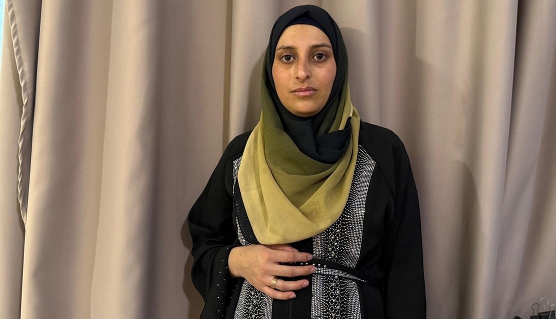 Omaya, pregnant and exhausted by repeated conflict