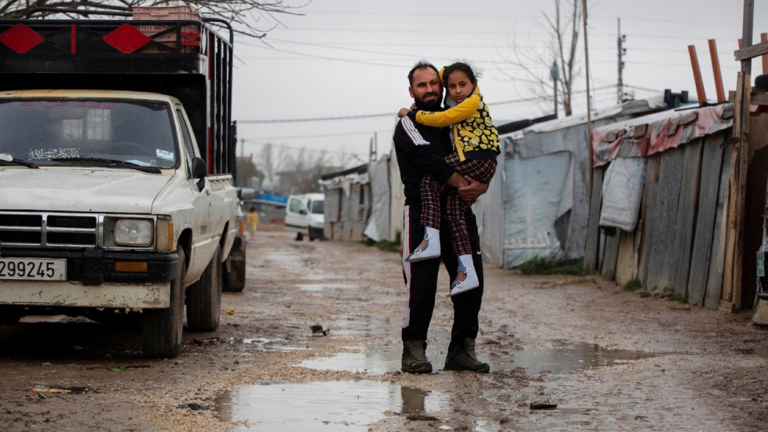 Adnan Al Hussein et sa fille Nada dans un camp informel au Liban après avoir fui Idlib, en Syrie, en 2013.